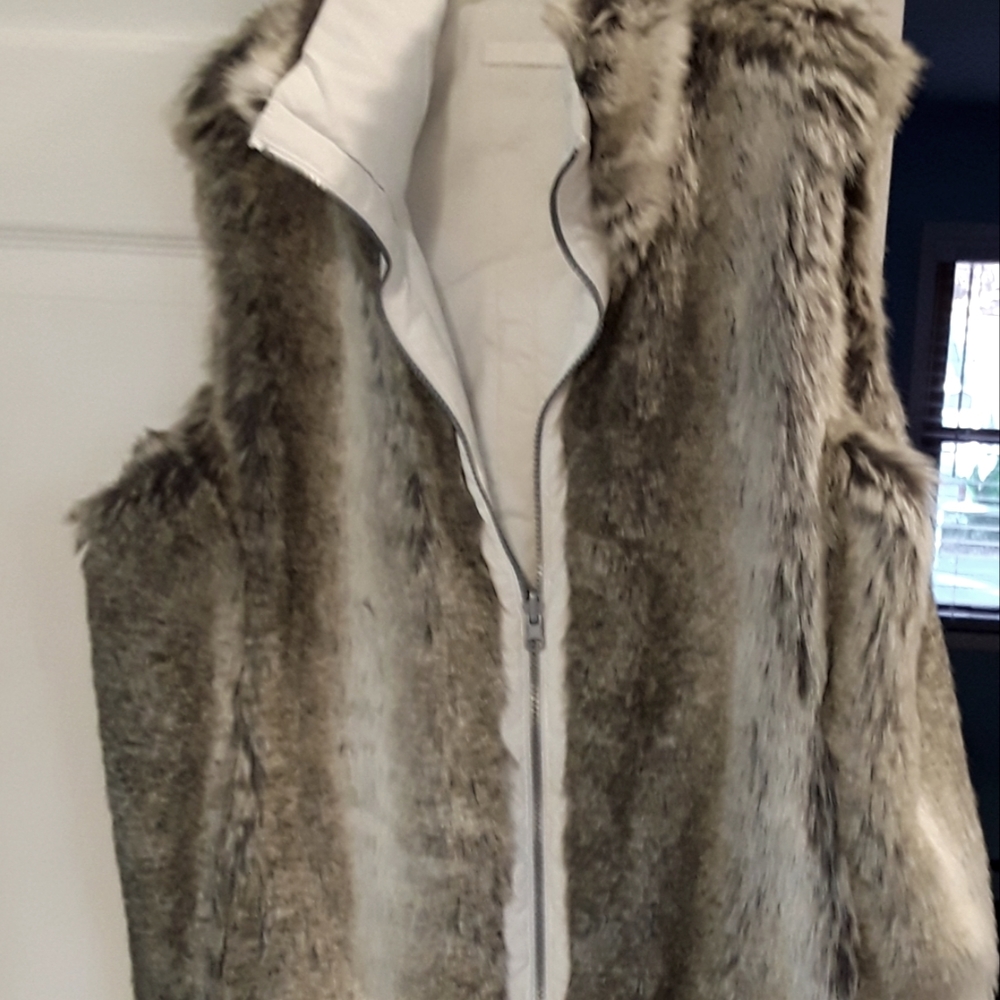 Used White reversible vest  very soft inside and out
